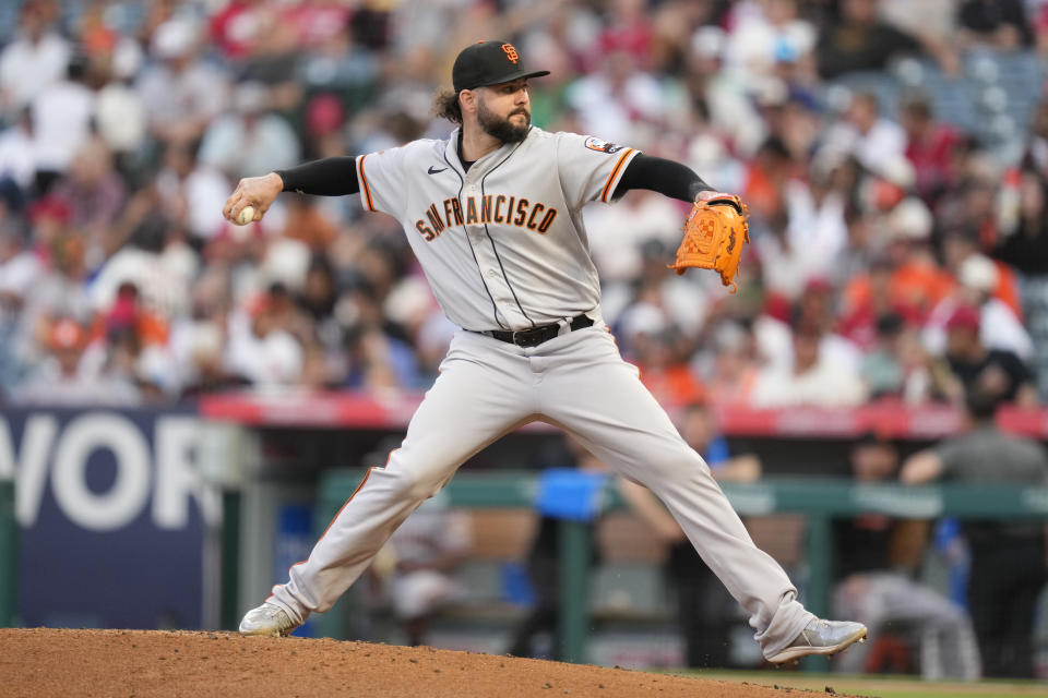San Francisco Giants relief pitcher Jakob Junis (34) throws during the first inning of a baseball game against the Los Angeles Angels in Anaheim, Calif., Tuesday, Aug. 8, 2023. (AP Photo/Ashley Landis)