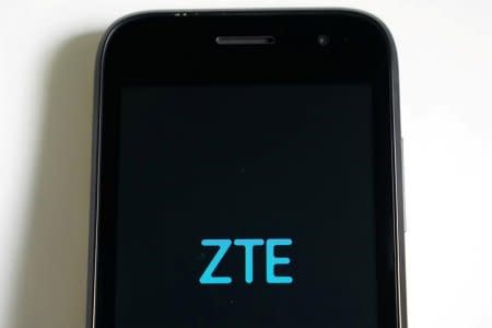 FILE PHOTO: A ZTE smart phone is pictured in this illustration taken April 17, 2018.   REUTERS/Carlo Allegri/Illustration/File Photo