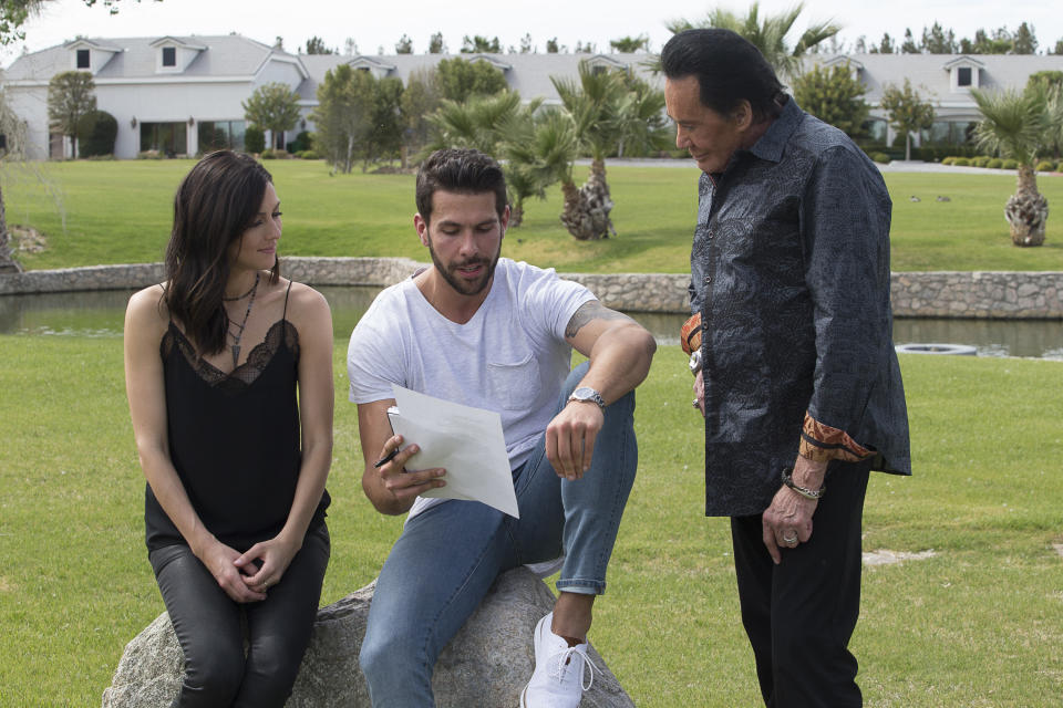 Becca and Chris during a group date with entertainer Wayne Newton on "The Bachelorette." (Photo: ABC/Paul Hebert)