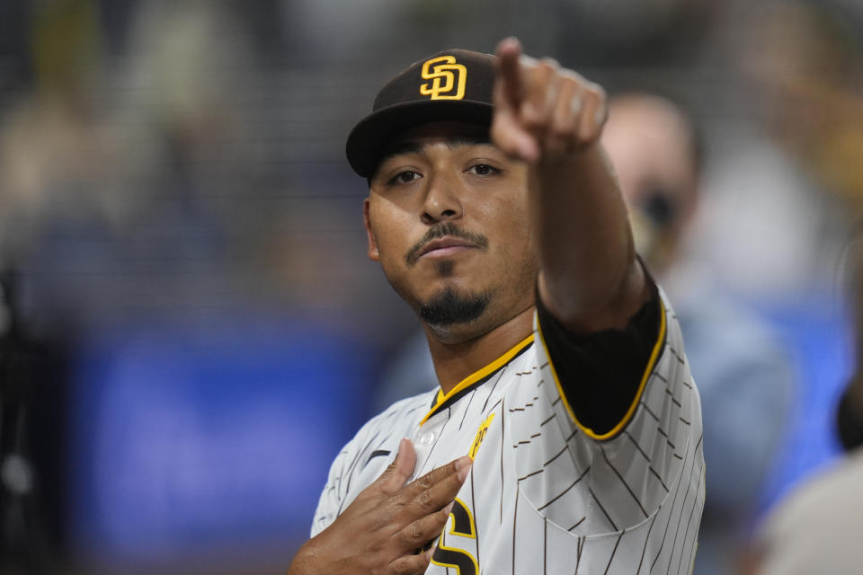 San Diego Padres relief pitcher Jeremiah Estrada celebrates after the Padres defeated the Miami Marlins 4-0 in a baseball game Tuesday, May 28, 2024, in San Diego. Estrada extended his club-record strikeout streak to 13 straight batters, the most in the expansion era. (AP Photo/Gregory Bull)