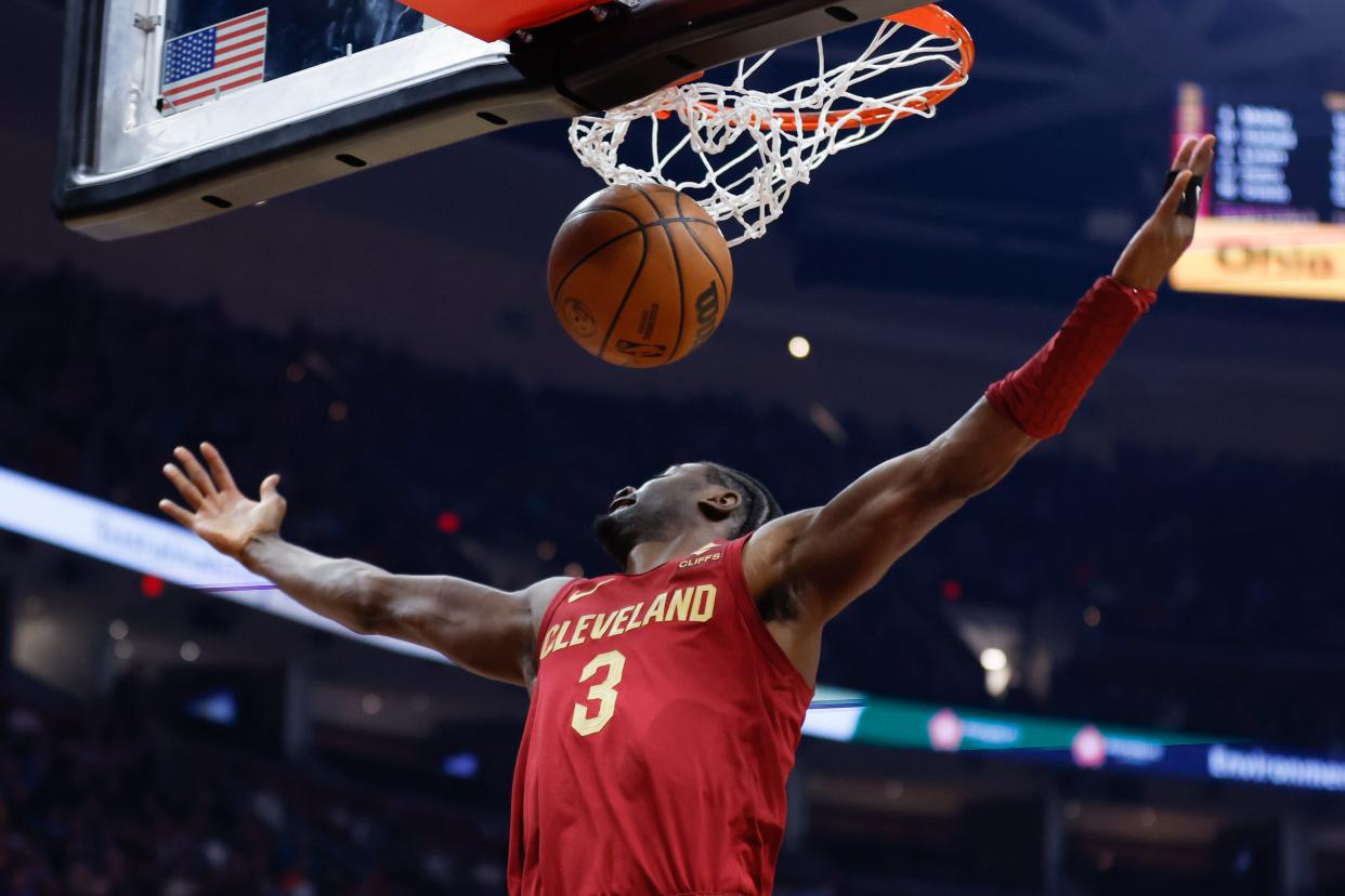 Cavaliers guard Caris LeVert dunks against the Rockets during the first half, Sunday, March 26, 2023, in Cleveland.