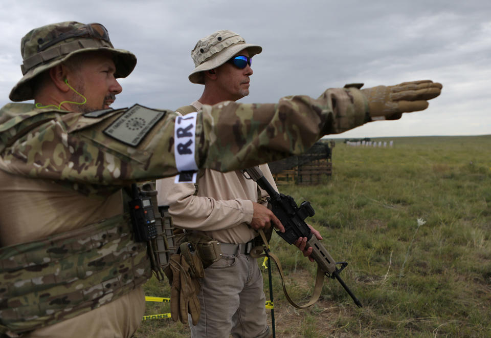 <p>Members of self-described patriot groups and militias prepare to run through shooting drills during III% United Patriots’ Field Training Exercise outside Fountain, Colo., July 29, 2017. (Photo: Jim Urquhart/Reuters) </p>