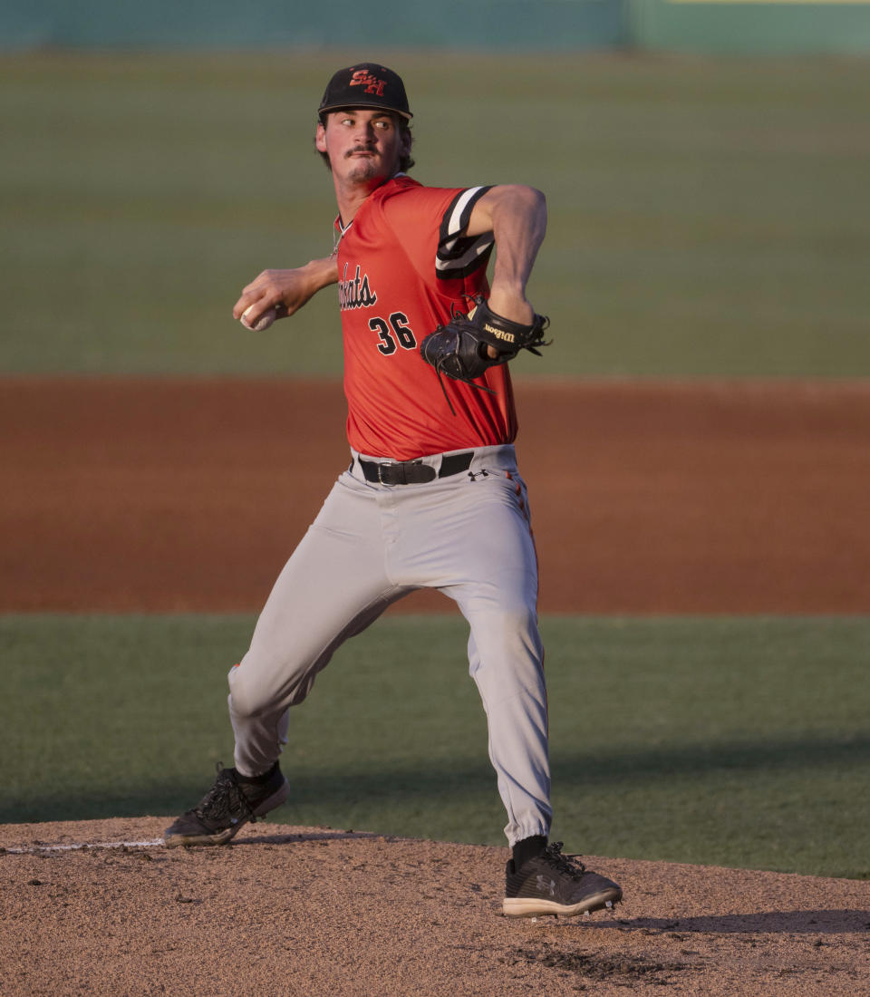 Sam Houston State's Coltin Atkinson pitches against Oregon State during an NCAA college baseball tournament regional game Friday, June 2, 2023, in Baton Rouge, La. (Hilary Scheinuk/The Advocate via AP)