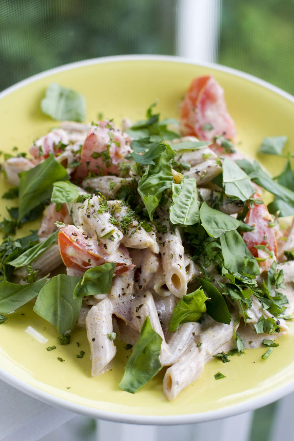 In this image taken on July 8, 2013, fast and fresh summer pasta is shown served on a plate in Concord, N.H. (AP Photo/Matthew Mead)