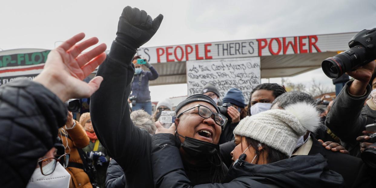 People react after the verdict in the trial of former Minneapolis police officer Derek Chauvin, found guilty of the death of George Floyd, at George Floyd Square in Minneapolis, Minnesota, U.S., April 20, 2021.