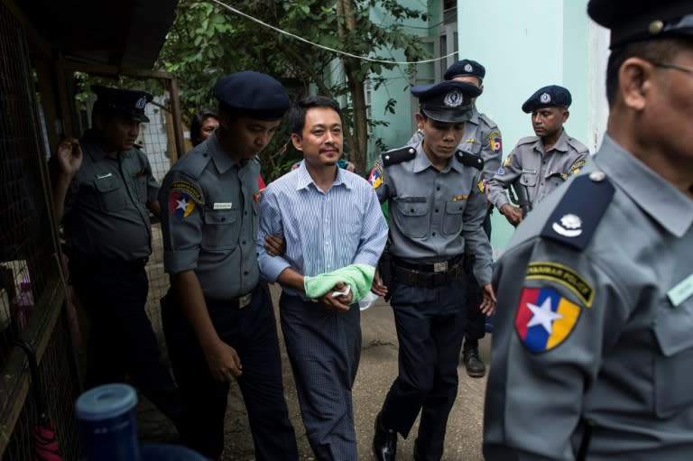 Kyaw Min Swe (C), editor-in-chief of The Voice, arrives for a court hearing this month: fears are growing for media freedom in Myanmar