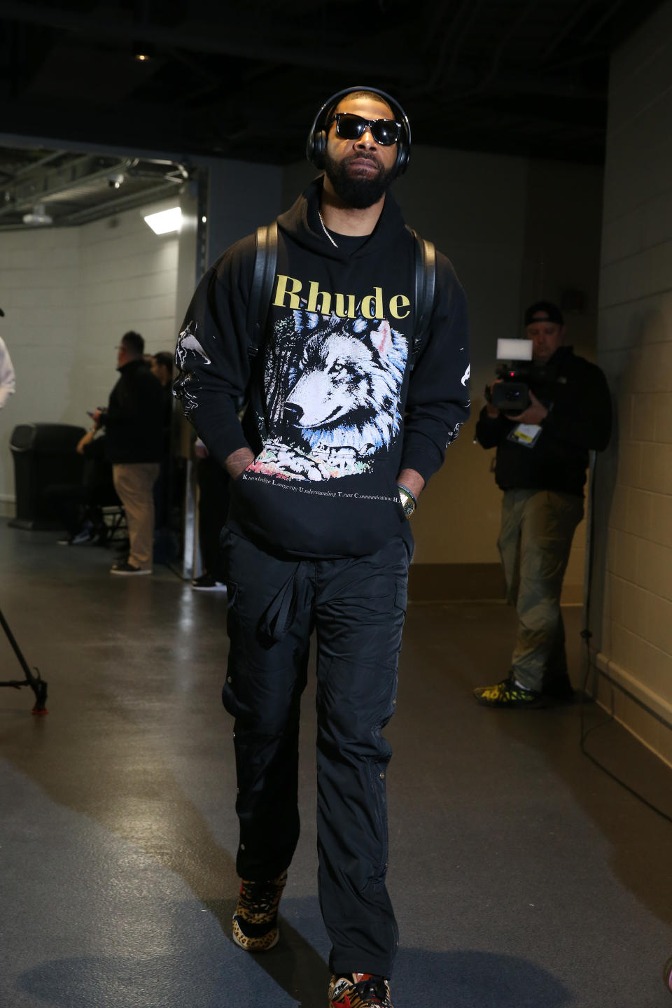 Marcus Morris of the Boston Celtics arrives ahead of Game Two wearing a Rhude hoodie and Atmos x Nike Air Force 1 Animal sneakers on April 30, 2019.