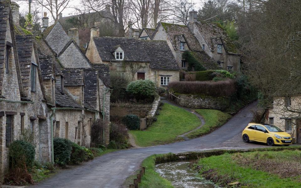 Targeted by vandals, the bright yellow car blamed on ruining view in Cotswolds village (but owner vows to buy lime green replacement)