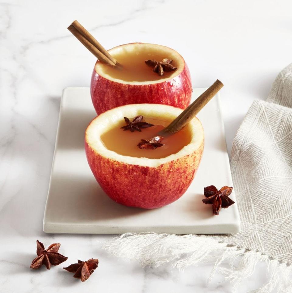 <p>How cute is this fall drink? All you have to do is hollow out the apples, fill with cider, and drink through cinnamon-stick straws! </p><p><em><a href="https://www.womansday.com/food-recipes/a33807296/apple-cinnamon-cider-cups-recipe/" rel="nofollow noopener" target="_blank" data-ylk="slk:Get the Apple-Cinnamon Cider Cups recipe.;elm:context_link;itc:0;sec:content-canvas" class="link ">Get the Apple-Cinnamon Cider Cups recipe. </a></em></p>