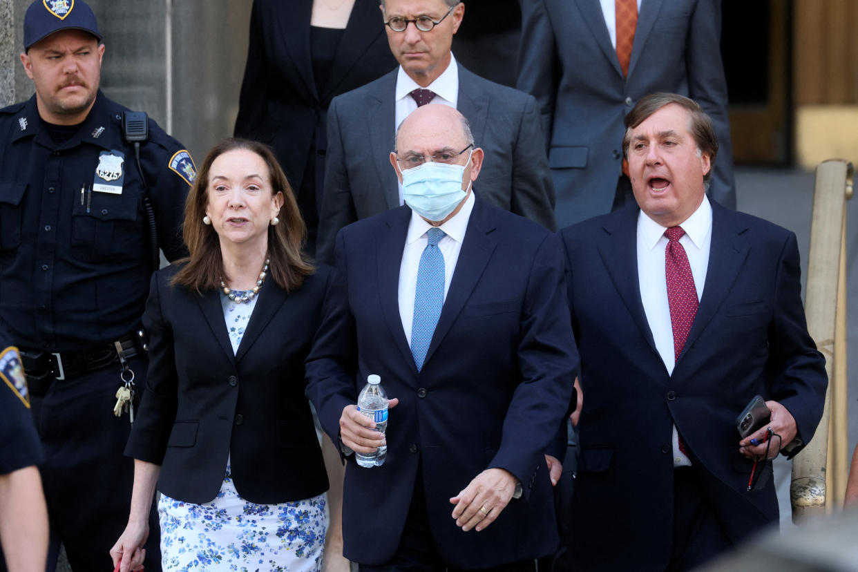 Allen Howard Weisselberg, the former Trump Organization CFO, exits New York State Supreme Court with his lawyers in the Manhattan borough of New York City, U.S., August 18, 2022.  REUTERS/Brendan McDermid