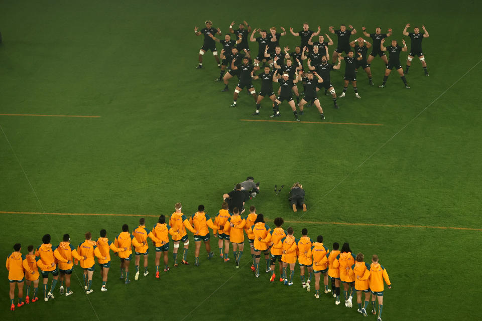Seen here, Wallabies players form a boomerang shape for the All Blacks' haka before the Bledisloe Cup Test in Melbourne. 
