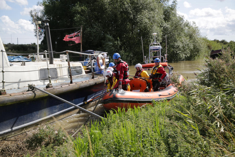 Search crews on the River Stour during the hunt for Lucas Dobson. (SWNS)