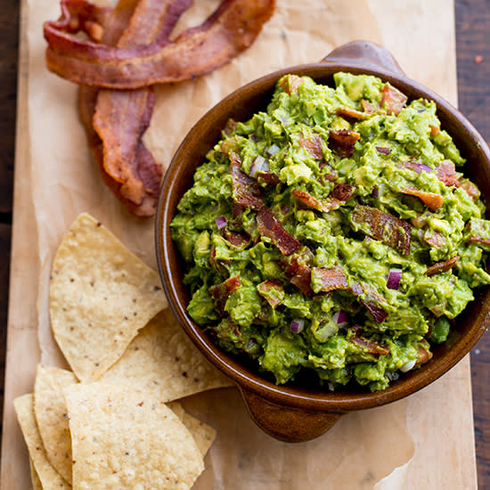 Celebrate National Tortilla Chip Day with an array of tasty dips. Get the recipes at Food & Wine.