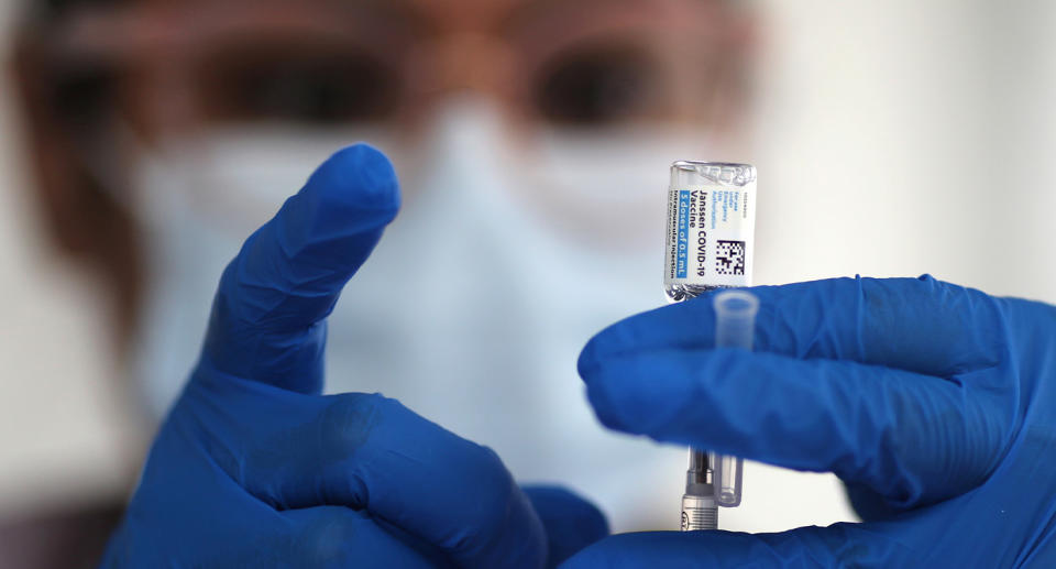 A nurse draws from a vial of Johnson & Johnson coronavirus disease (COVID-19) vaccine, in Los Angeles, USA. Photo: Reuters