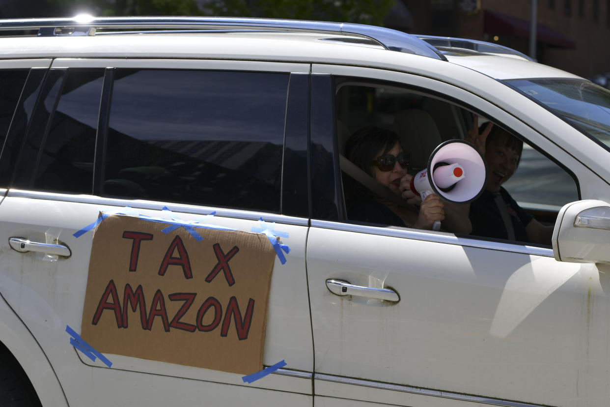 SEATTLE, WA - MAY 1: Tax Amazon caravan protest in Seattle, Washington During the coronavirus pandemic on May 01, 2020. Credit: Damairs Carter/MediaPunch /IPX