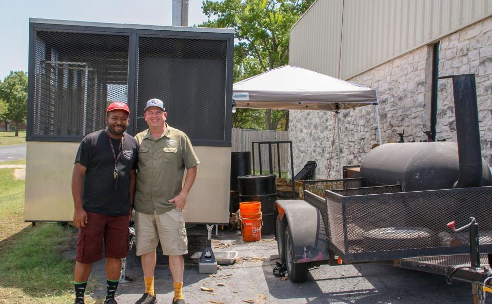 John Brotherton, right, with former Brotherton's Black Iron Barbecue pitmaster Dominic Colbert in 2018.