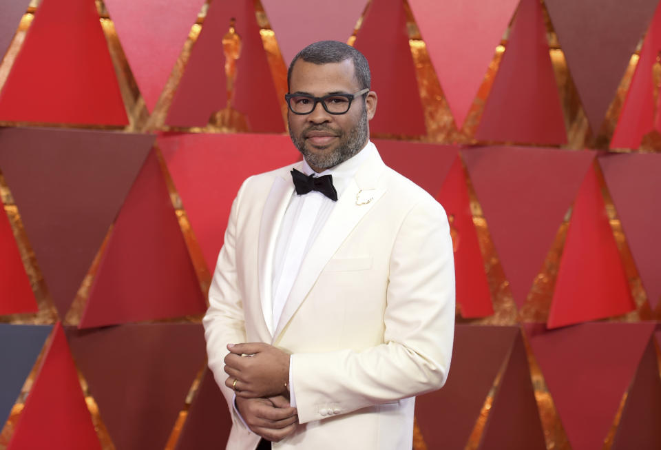 FILE - In this March 4, 2018 file photo, Jordan Peele arrives in Los Angeles. Peele’s “Us,” his anticipated follow-up to “Get Out,” will make its world premiere at the South by Southwest Film Festival. SXSW announced Tuesday that “Us” will open the 26th edition of the Austin, Texas, festival on March 8. Like Peele’s “Get Out,” “Us” is a socially minded horror thriller. (Photo by Richard Shotwell/Invision/AP, File)