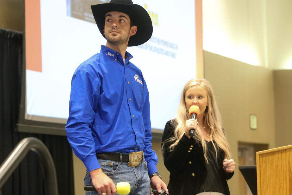 Caleb Thomas and Jordyn Barker speak to judges and a crowd of attendees at Texas A&amp;M University-Corpus Christi about a business opportunity Wednesday, April 20, 2022. The two competed in the institution&#39;s Ideas Challenge showcase.