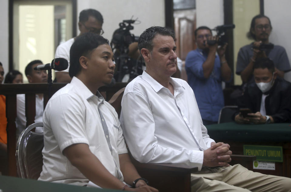 Australian Troy Smith, right, listens to his interpreter in a courtroom during his verdict trial at Denpasar district court in Bali, Indonesia on Thursday, July 4, 2024. Smith was allegedly caught with methamphetamine in his hotel on April 30. (AP Photo/Firdia Lisnawati)