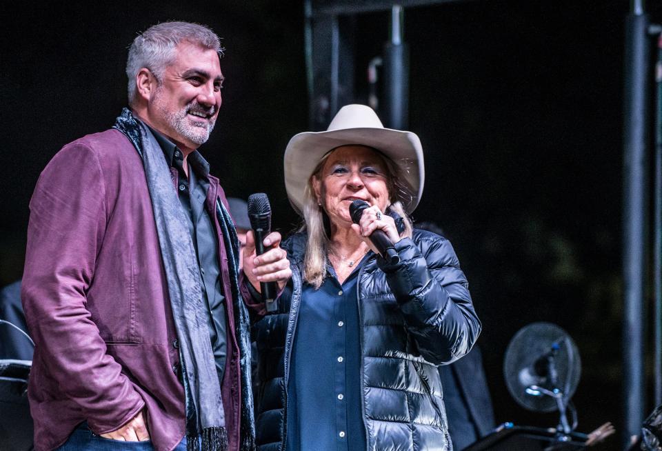 Co-hosts Taylor Hicks and Jett Williams and Taylor talk to  guests during the Bicentennial Concert in front of the Alabama State Capitol Building in Montgomery, Ala., on Saturday, Dec. 14, 2019.