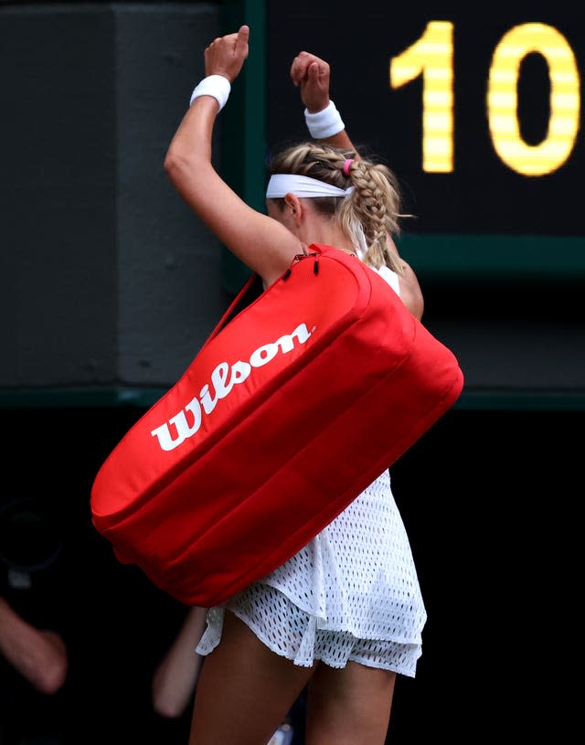 Victoria Azarenka reacts to the crowd booing her off the court after her defeat to Ukraine's Elina Svitolina