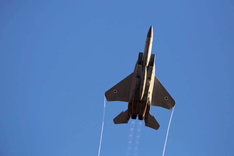 FILE PHOTO: An Israeli air force F-15 fighter jet flies during an exhibition as part of a pilot graduation ceremony in southern Israel