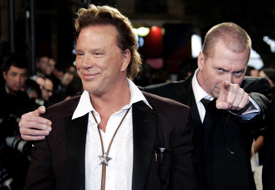 US actor Rourke and director Miller pose for the red carpet screening of "Sin City" at the 58th Cannes Film Festival. U.S. actor Mickey Rourke and director Frank Miller arrive for a red carpet screening of the in-competition Robert Rodriguez/Frank Miller film "Sin City" at the 58th Cannes Film Festival May 18, 2005. REUTERS/John Schults