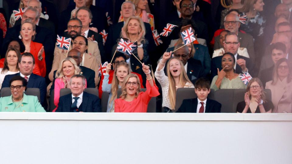 Peter Phillips and Lindsay Wallace take their seats at the heart of the royal family for the Coronation Concert at Windsor Castle 