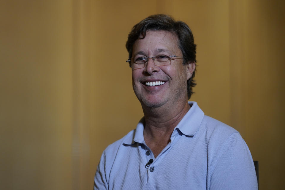 Neil Handler smiles as he speaks about his son Jonah, who was rescued after the Surfside, Fla., condo collapse, as he speaks during an interview with The Associated Press, Wednesday, June 15, 2022, in Bal Harbour, Fla. (AP Photo/Wilfredo Lee)