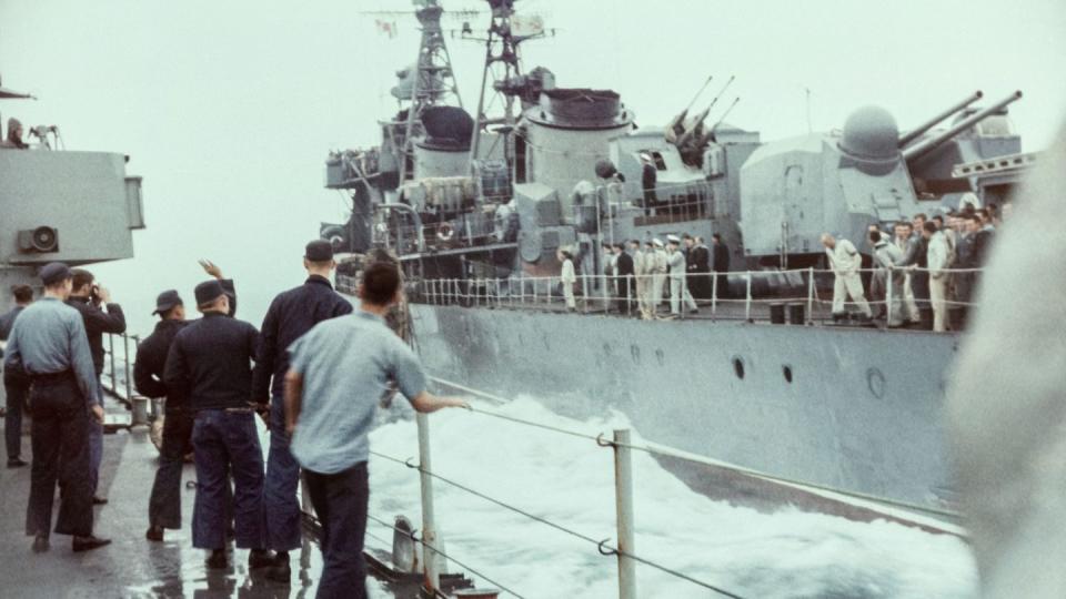 The Soviet Kotlin-class destroyer Besslednyi, right, is seen May 10, 1967, in the Sea of Japan shortly after the ship collided with the American destroyer Walker. (U.S. Navy/AFP via Getty Images)