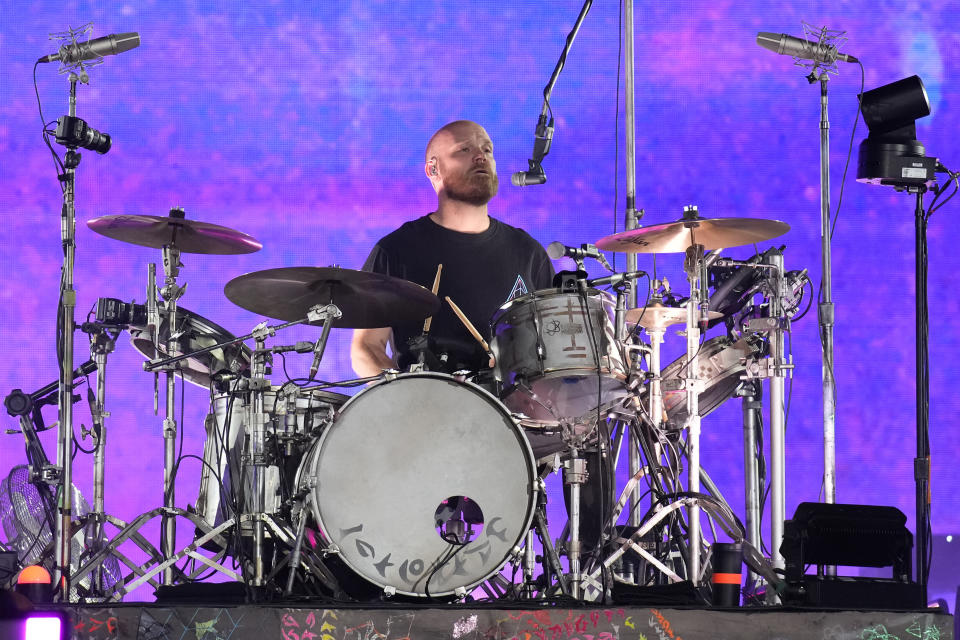Will Champion of Coldplay performs during the band's Music of the Spheres world tour on Thursday, May 12, 2022, at State Farm Stadium in Glendale, Ariz. (Photo by Rick Scuteri/Invision/AP)