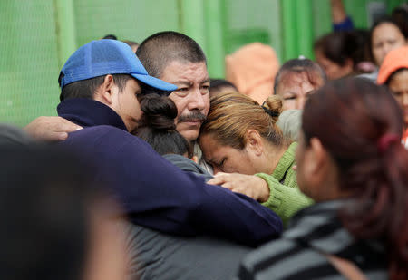 Relatives of inmates react outside the Cadereyta state prison after a riot broke out at the prison, in Cadereyta Jimenez, on the outskirts of Monterrey, Mexico October 11, 2017. REUTERS/Daniel Becerril