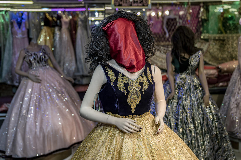 FILE - A mannequin's face is covered by a cloth in a woman's dress shop in Kabul, Afghanistan, Monday, Dec. 26, 2022. (AP Photo/Ebrahim Noroozi, File)