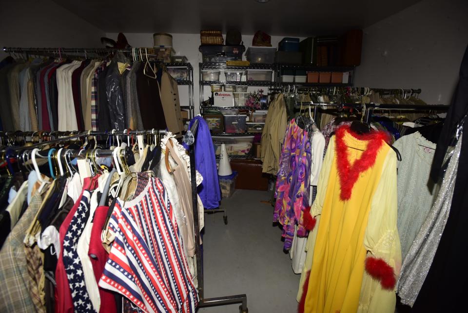 Various old theater costumes and set pieces clustered in the costume room inside the theatre's storage facility at Klecha Park in St. Clair on Wednesday, August 3, 2022.