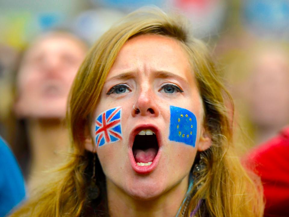 Demonstrators shout outside the Houses of Parliament during a protest aimed at showing London's solidarity with the European Union following the recent EU referendum, in central London, Britain June 28, 2016.