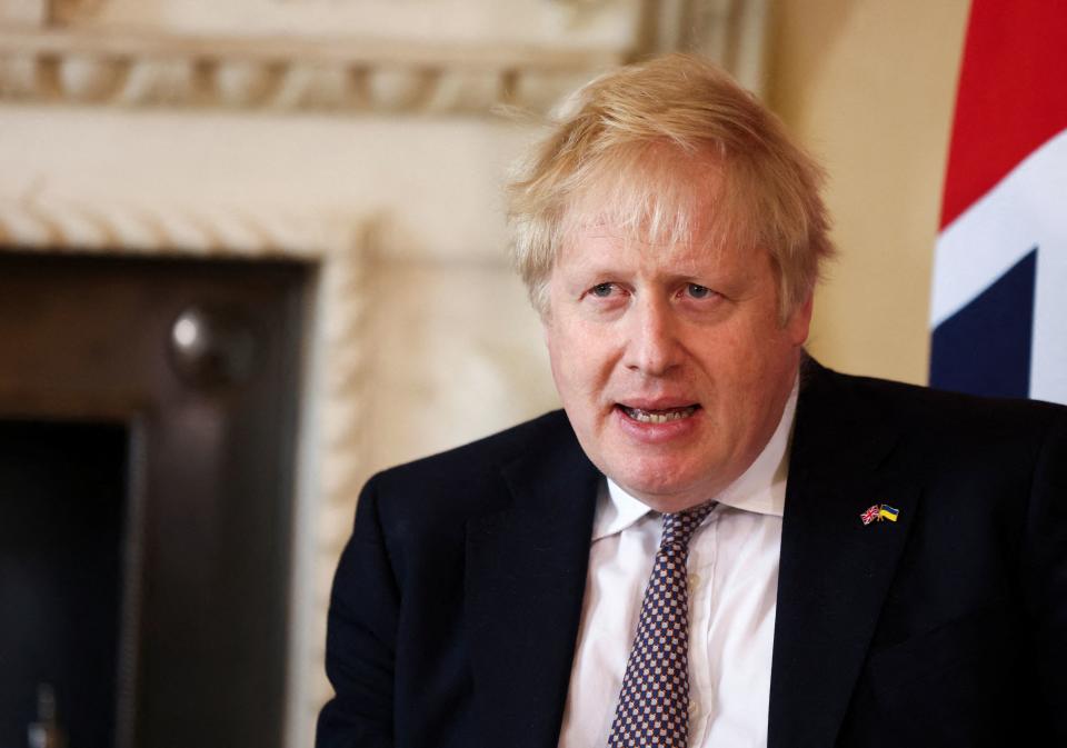 Britain's Prime Minister Boris Johnson speaks during a meeting with Germany's Chancellor Olaf Scholz (not pictured) inside 10 Downing Street in London, on April 8, 2022. (Photo by TOM NICHOLSON / POOL / AFP) (Photo by TOM NICHOLSON/POOL/AFP via Getty Images)