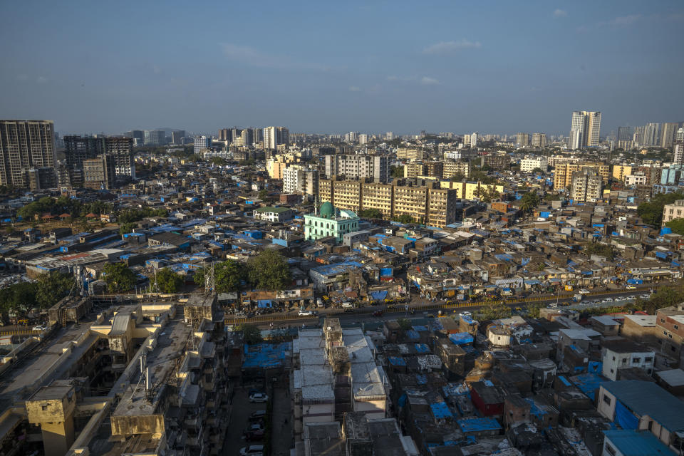 Dharavi, one of Asia's largest slums, in Mumbai, India, is seen on Friday, May 5, 2023. The neighborhood receives municipal water from outside spigots for a few hours each morning. (AP Photo/Dar Yasin)