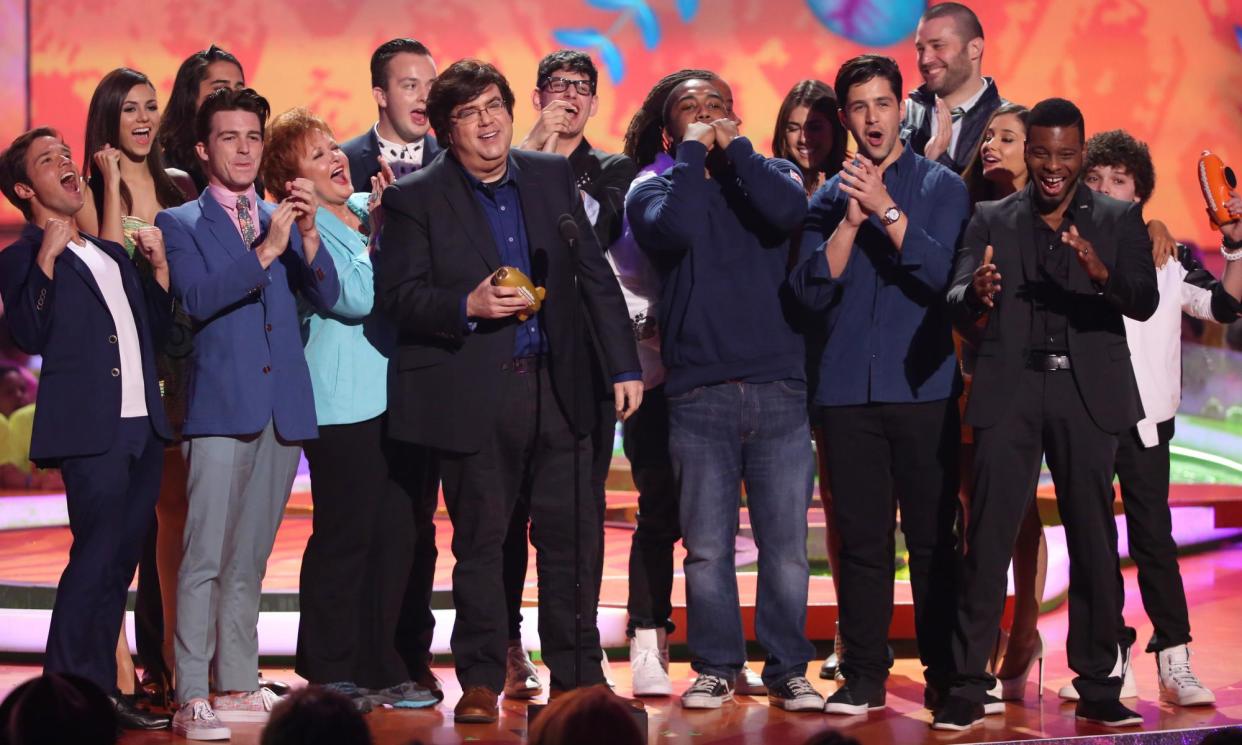 <span>Anything that makes this less likely to happen again is invaluable … Dan Schneider accepts a lifetime achievement award at the Kids' Choice awards, 2014.</span><span>Photograph: Matt Sayles/Invision/AP</span>