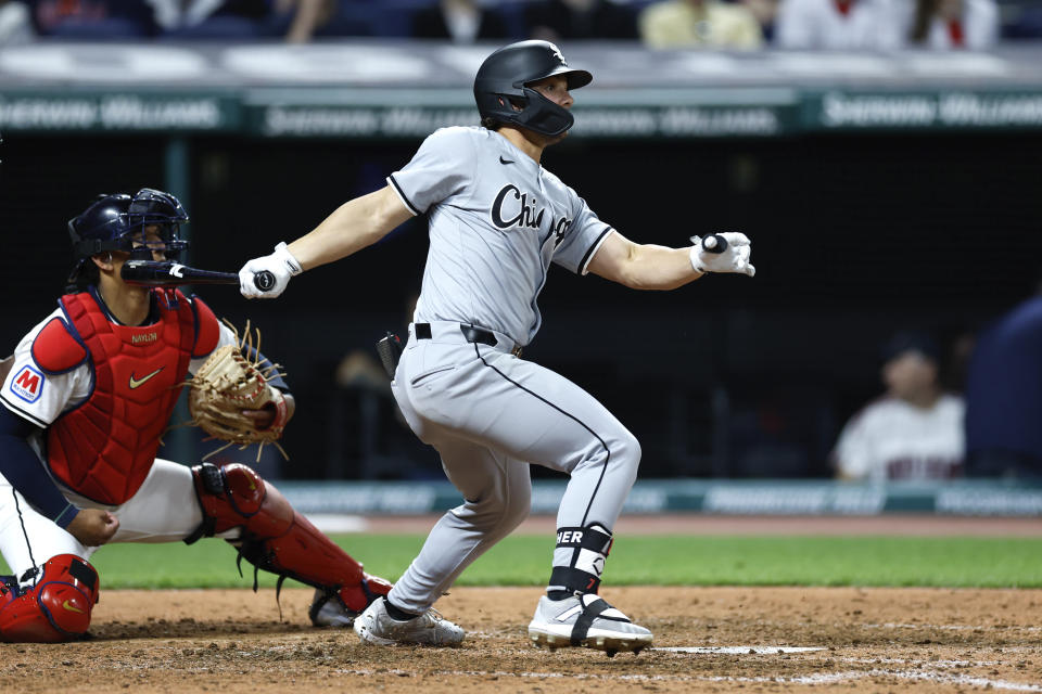 Chicago White Sox's Dominic Fletcher watches his two-run double off Cleveland Guardians pitcher Scott Barlow during the eighth inning of a baseball game, Tuesday, April 9, 2024, in Cleveland. (AP Photo/Ron Schwane)