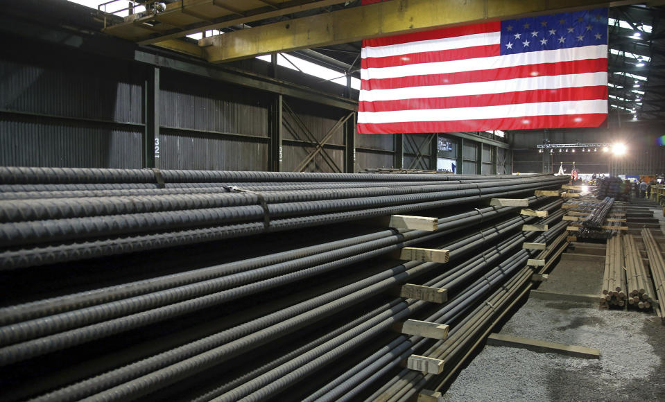 FILE - In this May 9, 2019, photo, steel rods produced at the Gerdau Ameristeel mill in St. Paul, Minn. await shipment. Last week's flareup over the Mexico tariffs may prove to be a pivotal juncture. The spat was especially alarming to businesses because it came seemingly out of nowhere. Less than two weeks earlier, President Donald Trump had lifted tariffs on Mexican and Canadian steel and aluminum, action that seemed to signal warmer commercial ties between the United States and its neighbors. (AP Photo/Jim Mone, File)