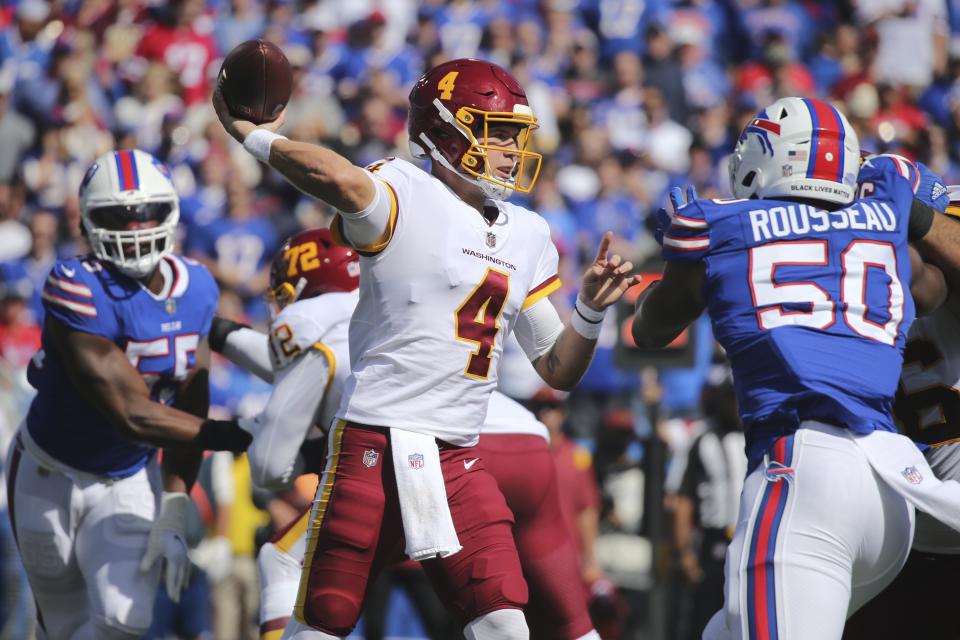 Washington Football Team quarterback Taylor Heinicke (4) throws a pass during the first half of an NFL football game against the Buffalo Bills, Sunday, Sept. 26, 2021, in Orchard Park, N.Y. (AP Photo/Jeffrey T. Barnes)