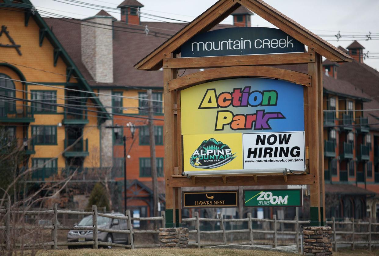 A sign advertising Mountain Creek's water park as Action Park is seen Wednesday, April 2, 2014 in Vernon.