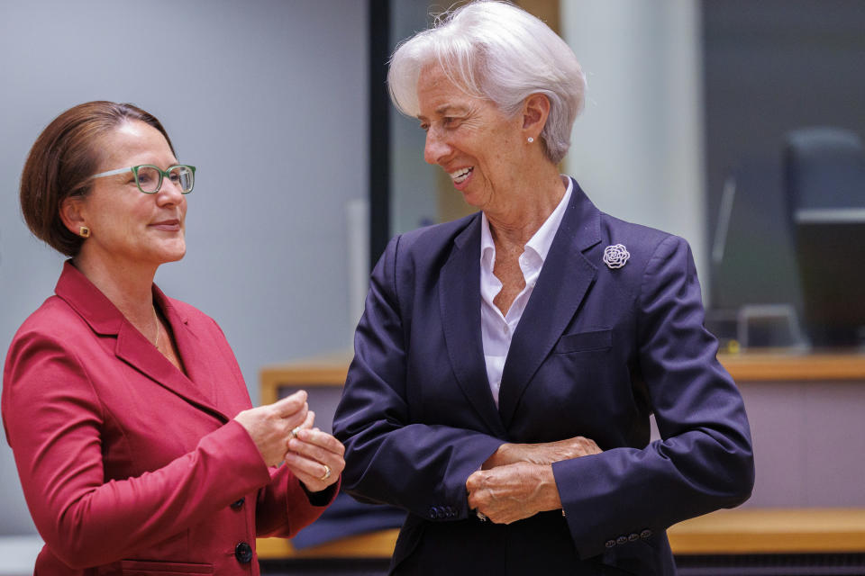 Finance Minister of Luxembourg Yuriko Backes, left, talks with European Central Bank ECB President Christine Lagarde prior to a meeting of eurogroup finance ministers at the European Council building in Brussels, Monday, May 23, 2022. Ministers from eurozone countries discuss economic governance and fiscal policies. (AP Photo/Olivier Matthys)