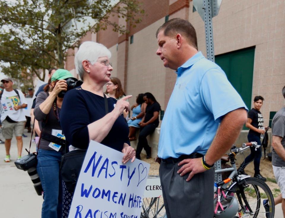 Boston Mayor Marty Walsh speaks with&nbsp;protesters.