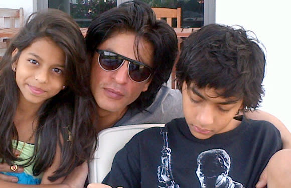 Shahrukh Khan<br><br>This superstar is always the best at what he does and being a father is no exception to this rule. He has 2 children with wife Gauri - Aryan and Suhana. Despite his super hectic schedule he always manages to find time to be by his childrens’ side and even attends their functions, stage performances, sports events, parent teacher meets etc. He has stated on numerous occasions that his family means the world to him. We can see his dedication towards his children by the fact that he decided to make 'Ra.One' just to impress his son who was fond of video games. He seems to be quite a doting dad.<br><br>These stars lead a super hectic life and are always in the limelight for the plethora of roles they play but playing the role of a father sure takes precedence for them.