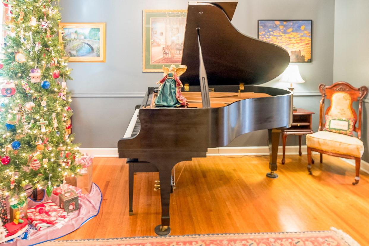 The baby grand piano is an heirloom from an aunt who was Vicki's piano teacher.