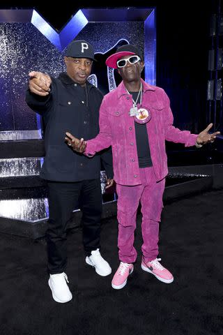 <p>Mike Coppola/Getty </p> Chuck D and Flavor Flav