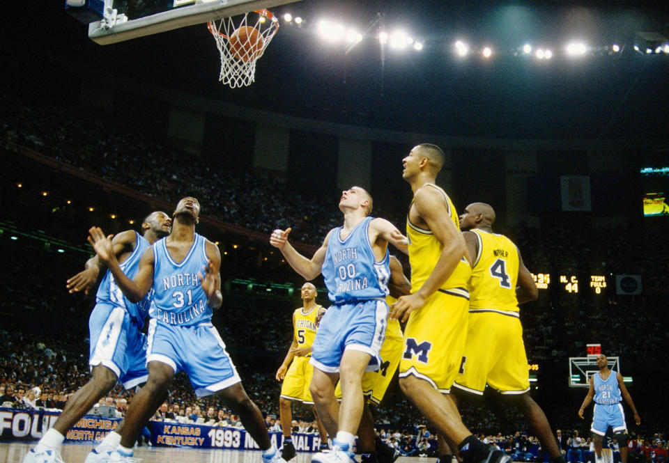 April 5, 1993; New Orleans, LA; Michigan Wolverines forward <a class="link " href="https://sports.yahoo.com/nba/players/2628/" data-i13n="sec:content-canvas;subsec:anchor_text;elm:context_link" data-ylk="slk:Juwan Howard;sec:content-canvas;subsec:anchor_text;elm:context_link;itc:0">Juwan Howard</a> (25) and Chris Weber (4) battle for position against North Carolina Tar Heels center Eric Montross (00) during the 1993 NCAA Men’s Final Four championship game at the Superdome. North Carolina defeated Michigan 77-71. MPS-USA TODAY Sports