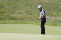 South Africa's Louis Oosthuizen putts on the 3rd hole during the final round of the British Open Golf Championship at Royal St George's golf course Sandwich, England, Sunday, July 18, 2021. (AP Photo/Peter Morrison)