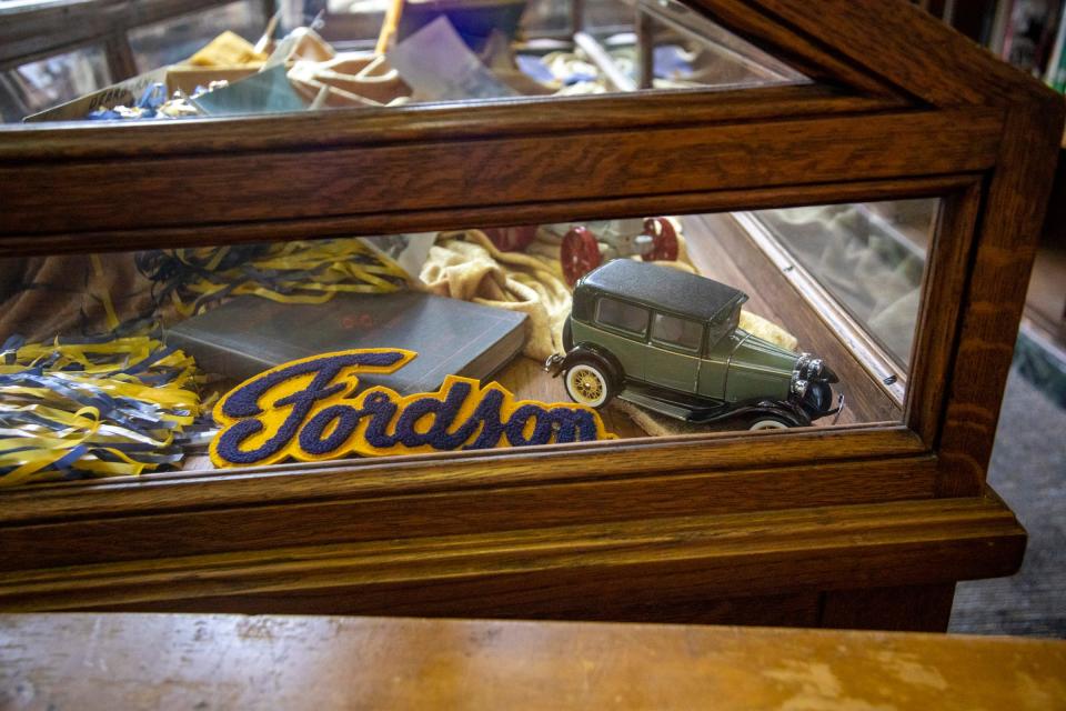 School Momentos decorate a display case inside the Fordson High School library in Dearborn on May 12, 2022.